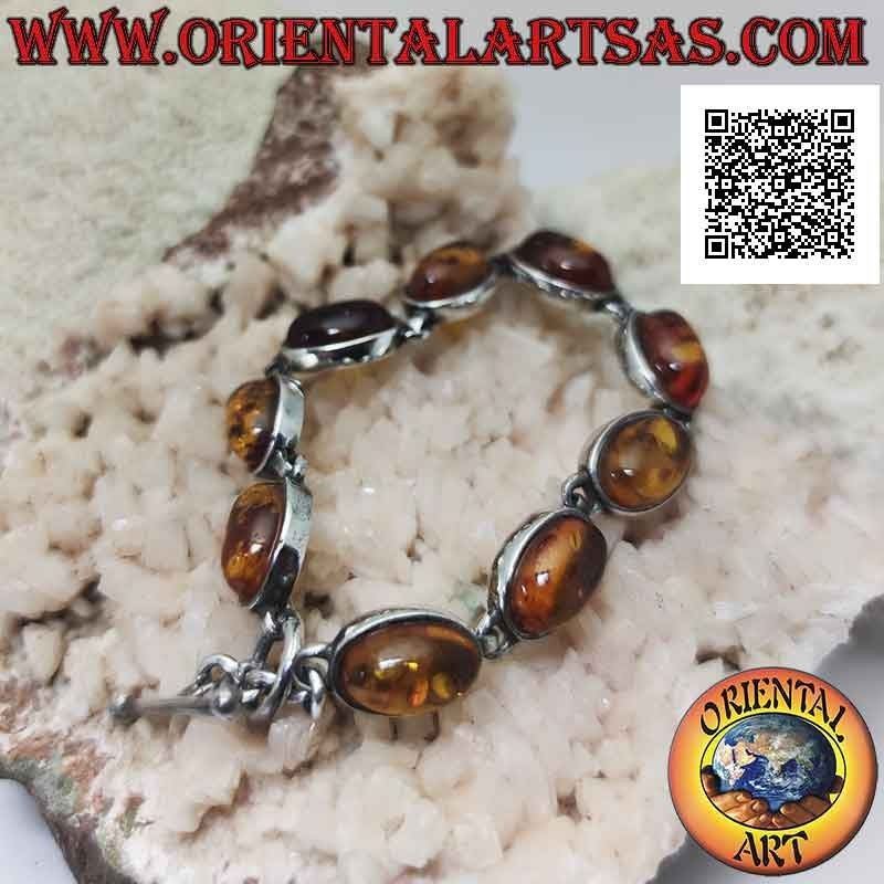 Bracelet en argent 925 ‰ avec neuf cabochons ovales en fil d'ambre à bord lisse