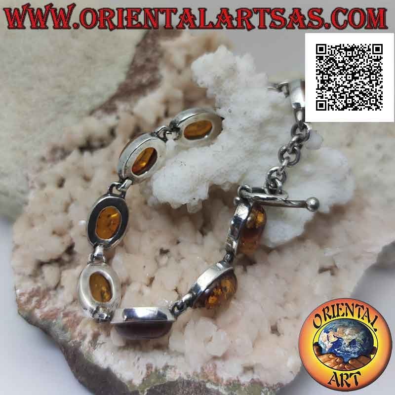 Pulsera de plata 925 ‰ con nueve cabujones ovalados de alambre de ámbar con borde liso