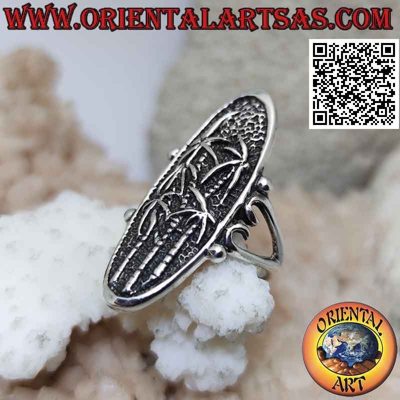 Oval silver ring with bas-relief bamboo forest