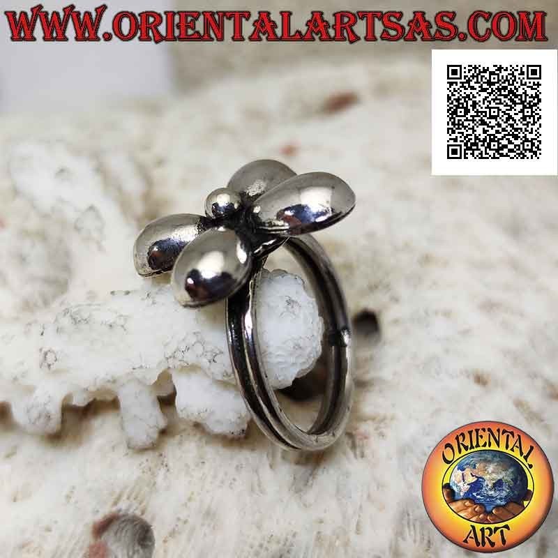 Silver ring in the shape of a flower with four smooth rounded petals and a central ball