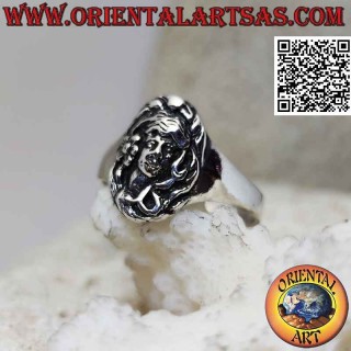 Silver ring with the face of the forest goddess in bas-relief in the oval