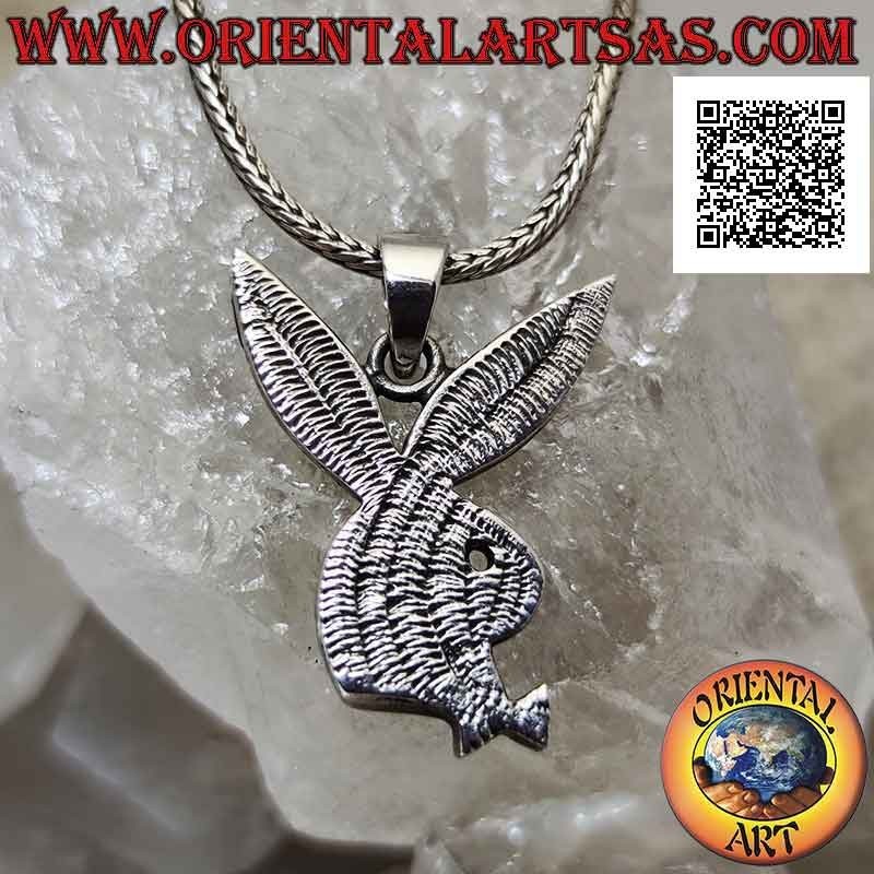 Silver pendant in the shape of a flat "playboy" bunny with deep engravings