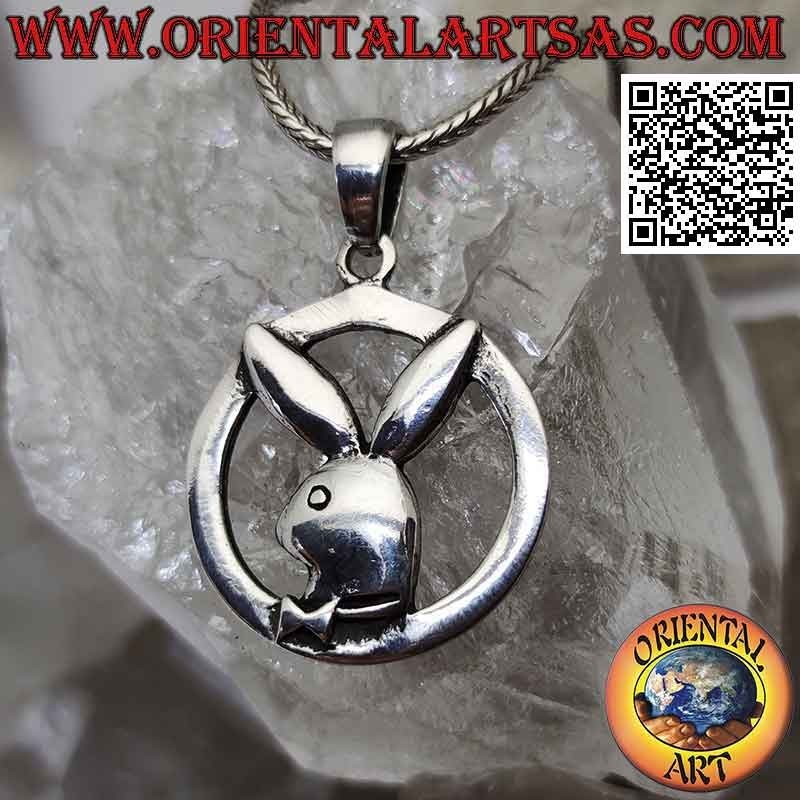 Silver pendant in the shape of a "playboy" bunny in the circle