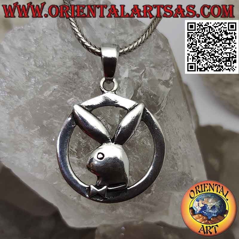 Silver pendant in the shape of a "playboy" bunny in the circle