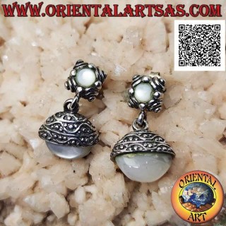 Silver lobe earrings with spherical oval mother-of-pearl in the cap with pendant ethnic engravings
