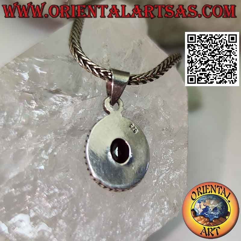 Silver pendant with natural oval faceted garnet surrounded by interweaving