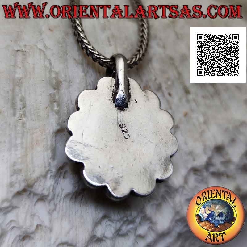 Silver pendant with natural round Tibetan turquoise surrounded by interweaving and ancient round corals