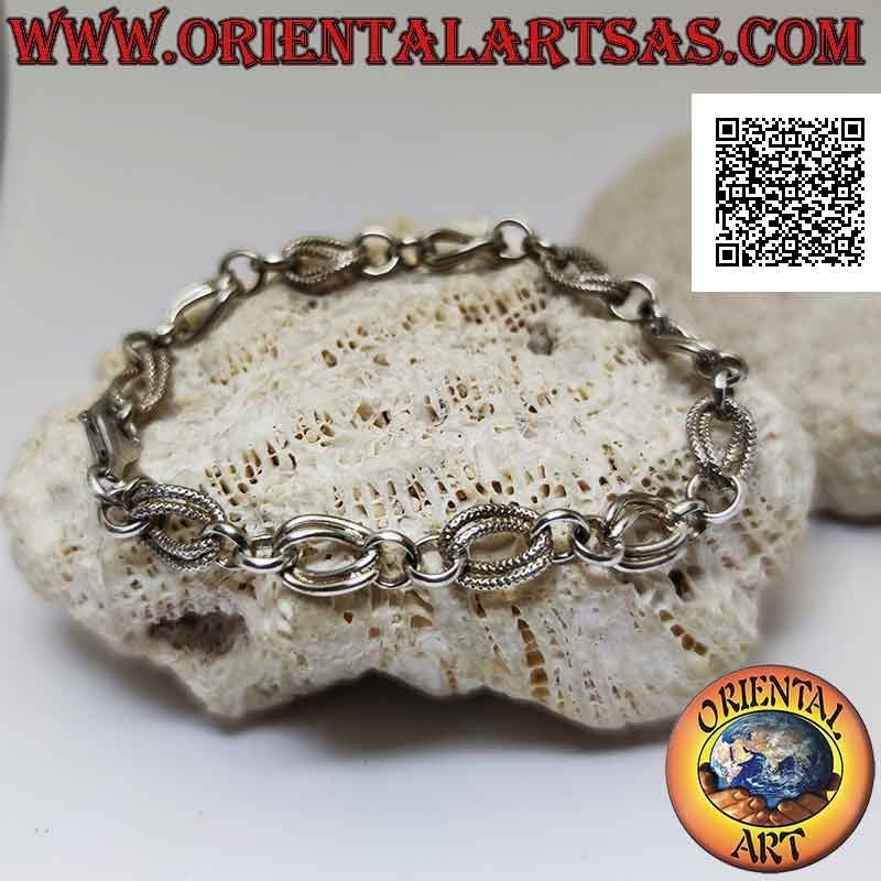 Bracelet in 925 ‰ silver with a chain of pairs of smooth rings and alternating curved ovals
