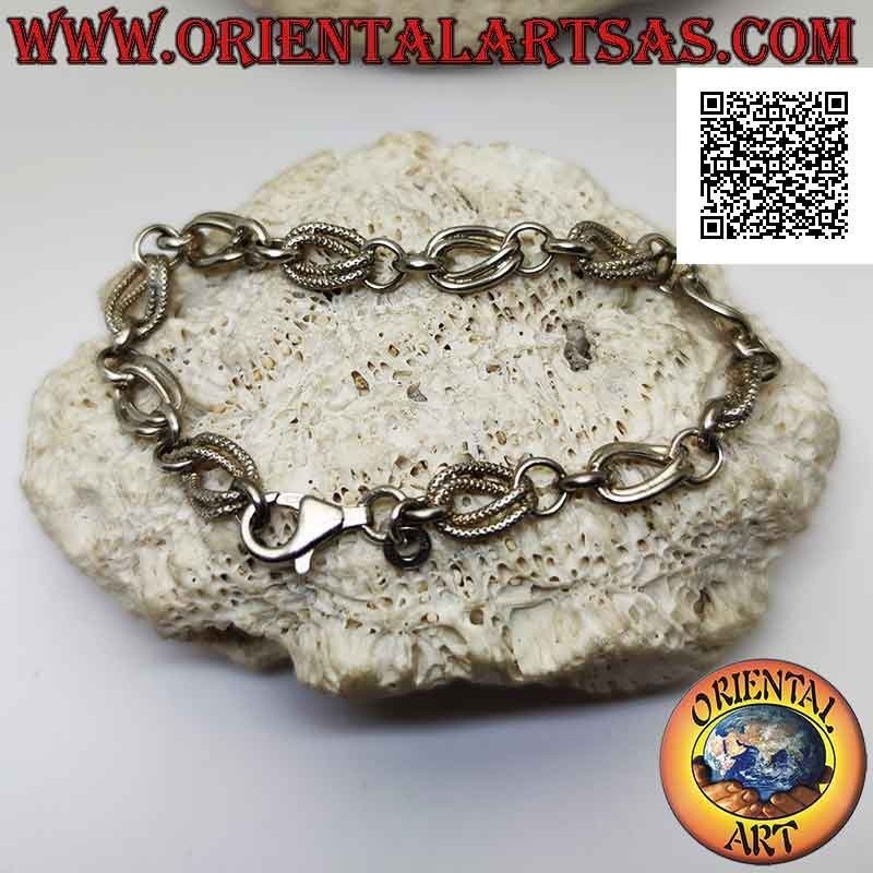 Bracelet in 925 ‰ silver with a chain of pairs of smooth rings and alternating curved ovals