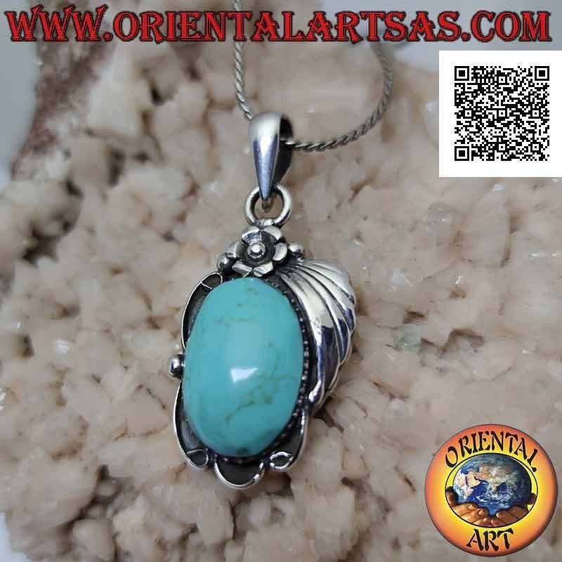 Pendentif en argent avec grand cabochon ovale en pâte turquoise et fleur avec feuille sur le dessus