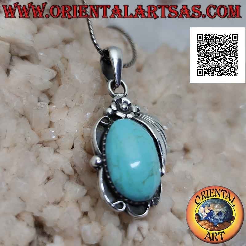 Silver pendant with large oval cabochon turquoise paste and flower with leaf on top