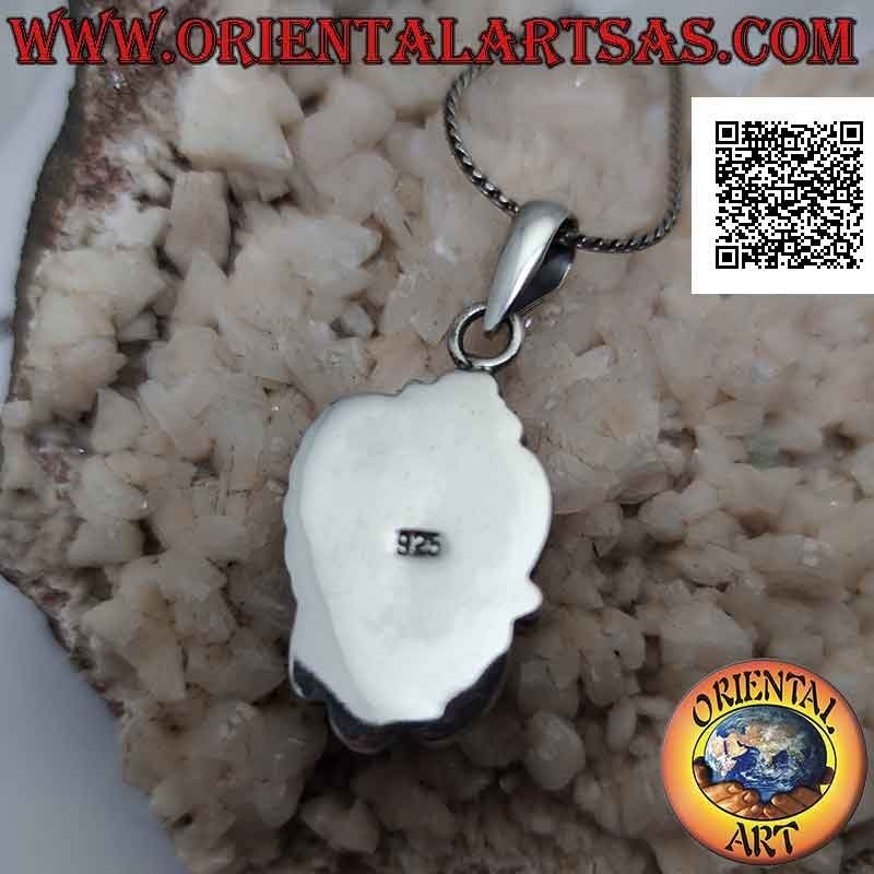 Pendentif en argent avec grand cabochon ovale en pâte turquoise et fleur avec feuille sur le dessus