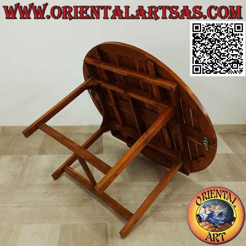 Round extendable garden table with slatted top in teak wood