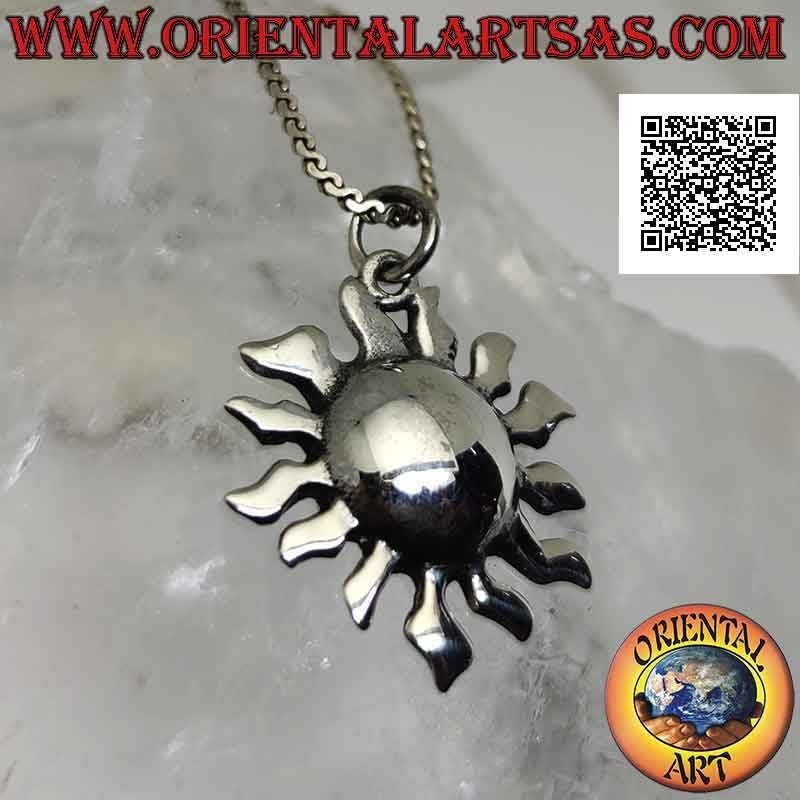 Smooth silver pendant in the shape of a sun with a rounded center and curved rays