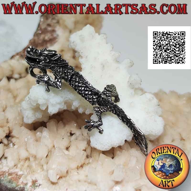 Silver pendant in the shape of an oriental (Chinese) dragon in three-dimensional movable integral