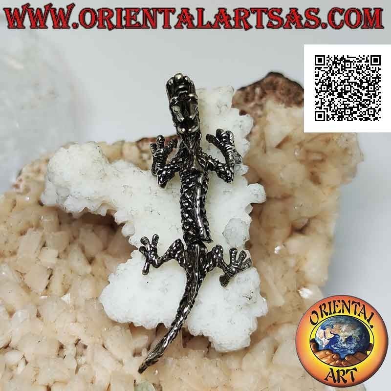 Silver pendant in the shape of an oriental (Chinese) dragon in three-dimensional movable integral