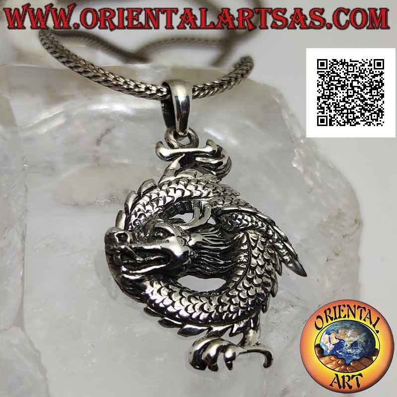 Silver dragon pendant tied in a circle with central head and paw above and below