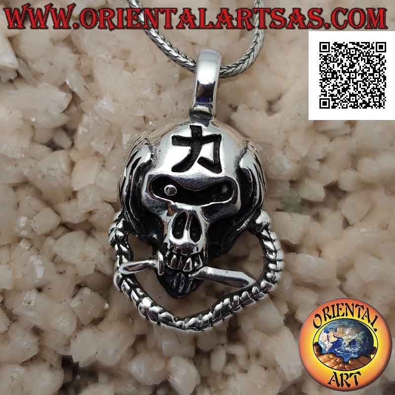 Silver pendant in the shape of a ninja skull with chain, dagger between the teeth and engraved Japanese symbol
