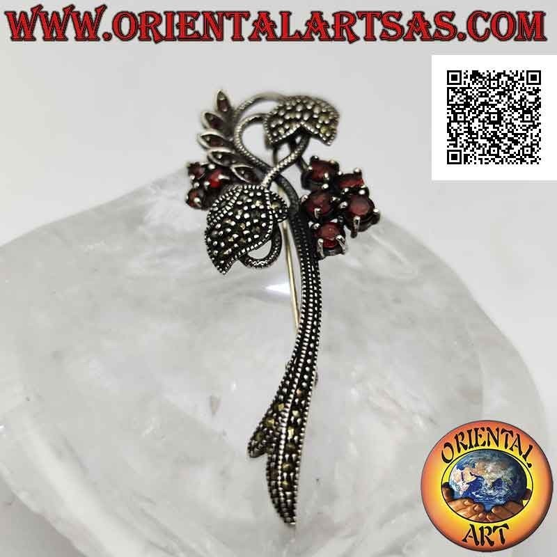 925 ‰ silver brooch in the shape of a floral plant studded with marcasite and round garnets set