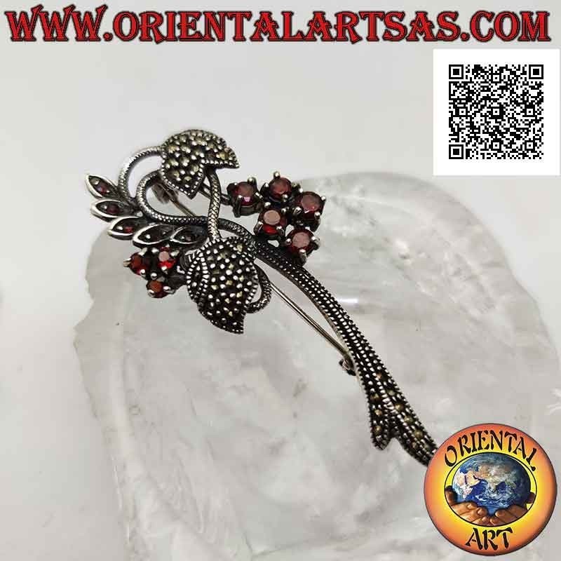 925 ‰ silver brooch in the shape of a floral plant studded with marcasite and round garnets set