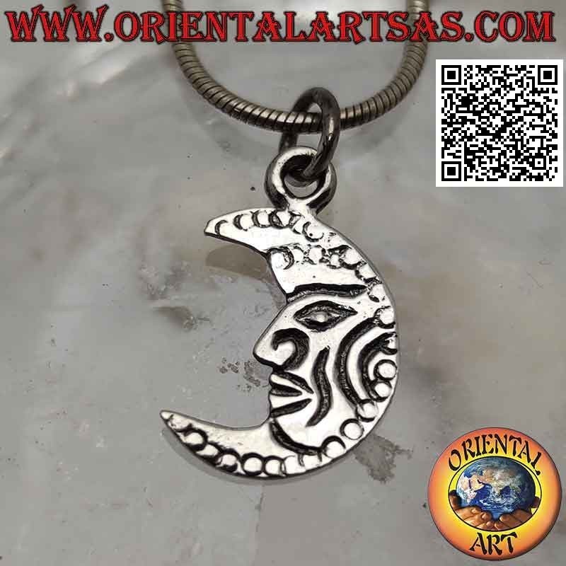 Pendentif en argent, croissant plat orné d'un visage gravé
