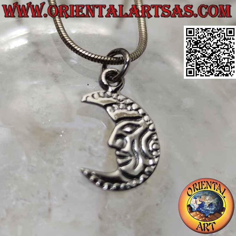Silver pendant, flat crescent decorated with engraved face