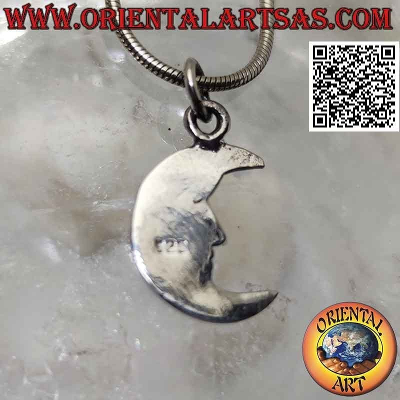 Pendentif en argent, croissant plat orné d'un visage gravé