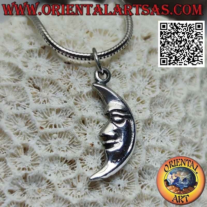 Silver pendant, crescent with shaped face