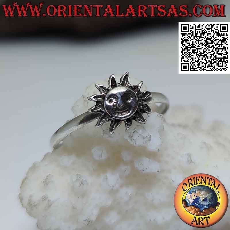 Silver ring with a small sun with a shaped face