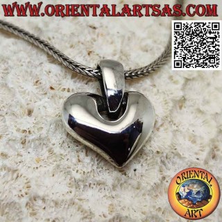 Three-dimensional smooth silver pendant in a modern style