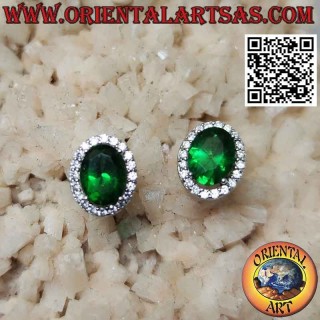 Silver earrings with oval synthetic emerald set surrounded by zircons