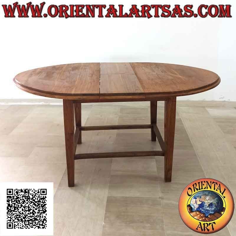 Mesa extensible ovalada con cuatro patas unidas en madera de teca (130 x 148 cm)