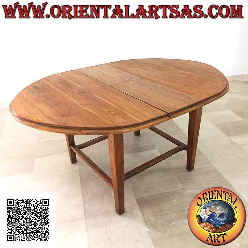 Mesa extensible ovalada con cuatro patas unidas en madera de teca (130 x 148 cm)
