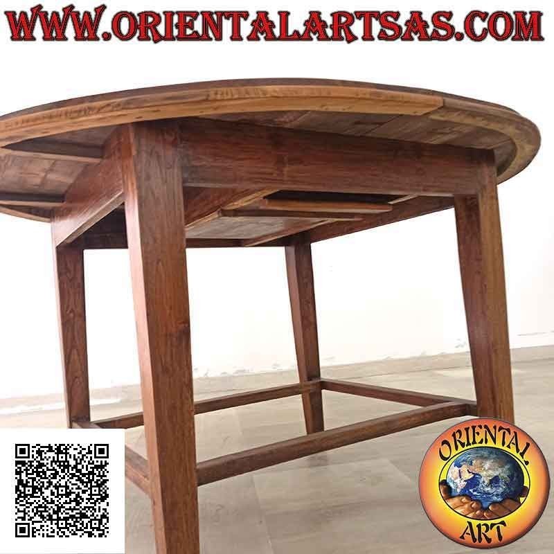 Mesa extensible ovalada con cuatro patas unidas en madera de teca (130 x 148 cm)