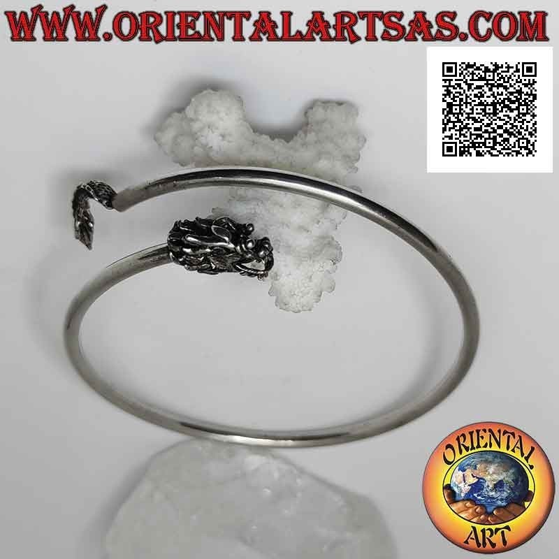 Rigid bracelet in 925 ‰ silver from smooth tubular forearm with dragon head and tail