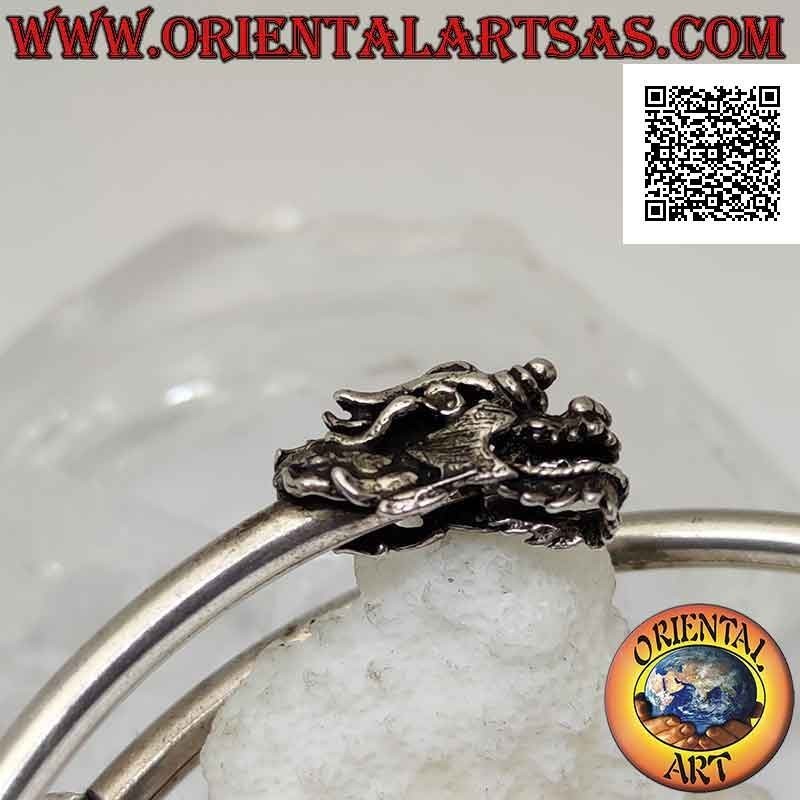 Rigid bracelet in 925 ‰ silver from smooth tubular forearm with dragon head and tail