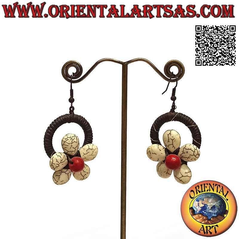 Pendientes de aro hechos a mano en técnica macramé con flor de pasta de howlita y centro de coral