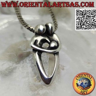 Silver pendant, the holy family embraced