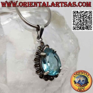 Silver pendant with drop-shaped blue topaz set surrounded by marcasite