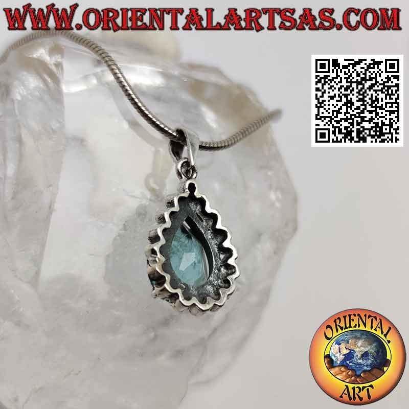 Silver pendant with drop-shaped blue topaz set surrounded by marcasite