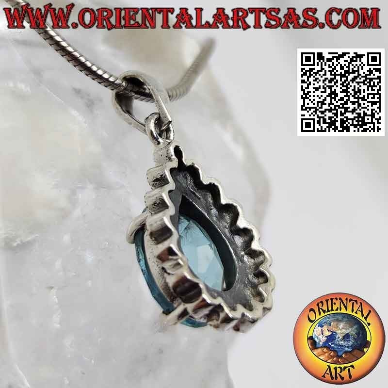 Pendentif en argent avec topaze bleue en forme de goutte sertie entourée de marcassite