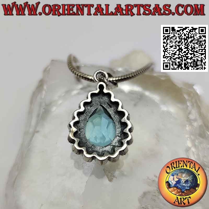 Silver pendant with drop-shaped blue topaz set surrounded by marcasite