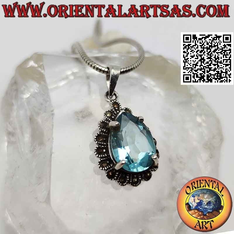 Colgante de plata con topacio azul en forma de gota rodeado de marcasita