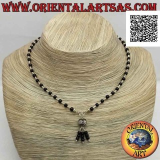 Choker necklace of onyx beads and 925 ‰ silver strung with a tuft