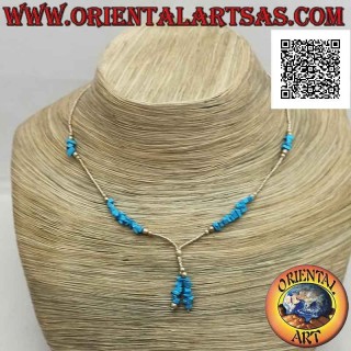 Collana girocollo di perline di argento 925 ‰ e frammenti di turchese infilati con ciuffetto