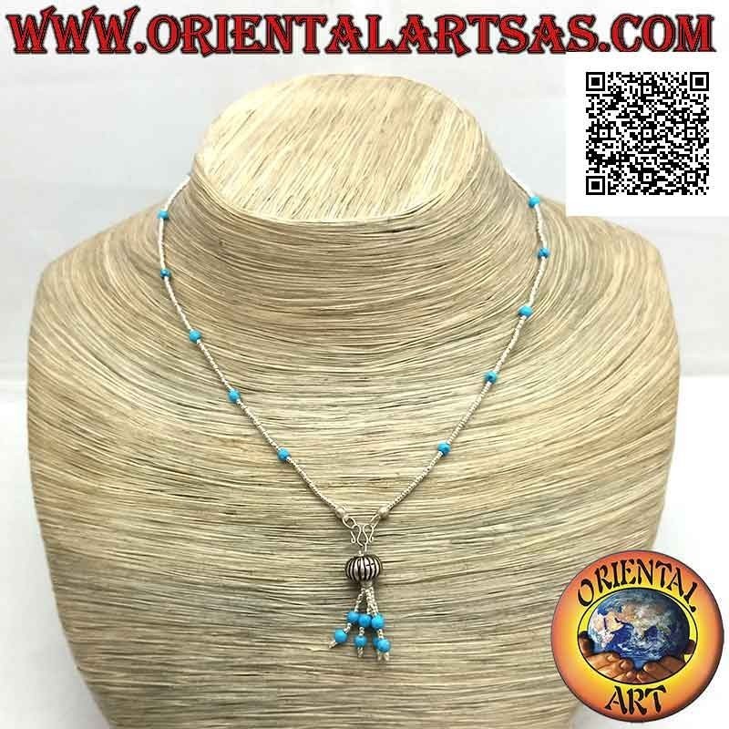 Choker necklace of turquoise and 925 ‰ silver beads strung with a tuft