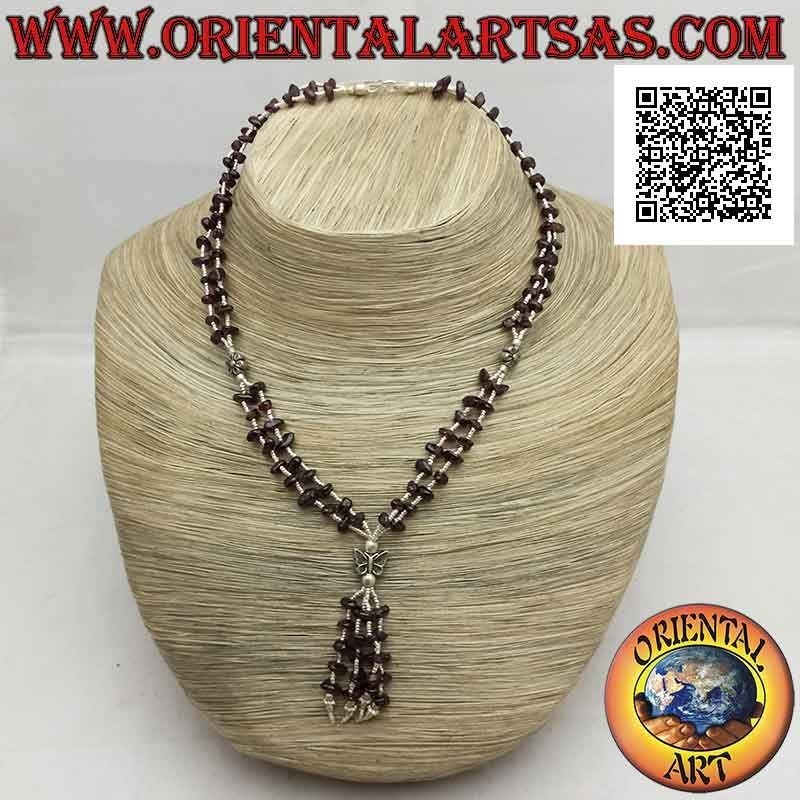 Collana a due fili di frammenti di granato e palline di argento 925 ‰ infilati con fiori, farfalla e ciuffetto