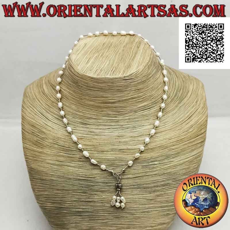 Choker necklace of freshwater pearls and 925 pall silver balls strung with a tuft