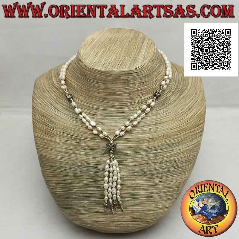 Two-row necklace of freshwater pearls and 925 ‰ silver balls strung with flowers, butterfly and tuft