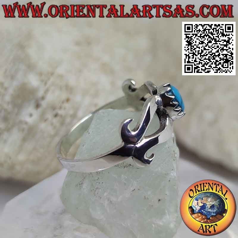 Anello in argento con turchese incastonato al centro di un infinito liscio